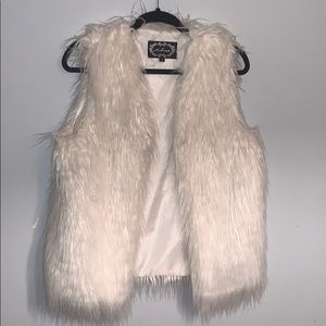 cute white faux fur vest!